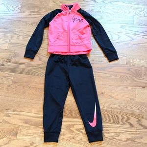 Girls Nike size 5 pink and black track suit